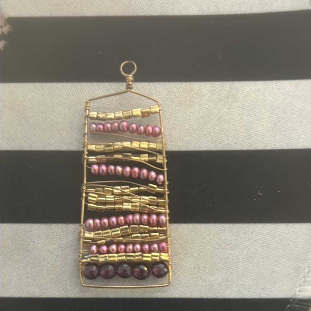 Elegant Gold and Purple Beaded Pendant